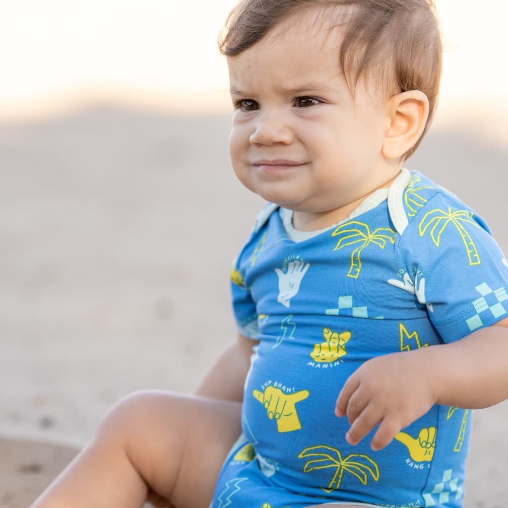 Blue Geometric Shaka Code Baby Onesie by Cocomoon Hawaii